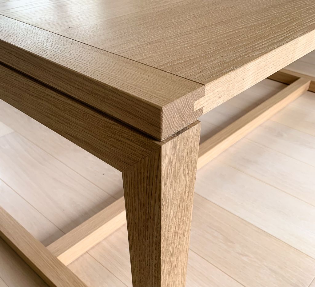corner detail of oak table showing breadboard end