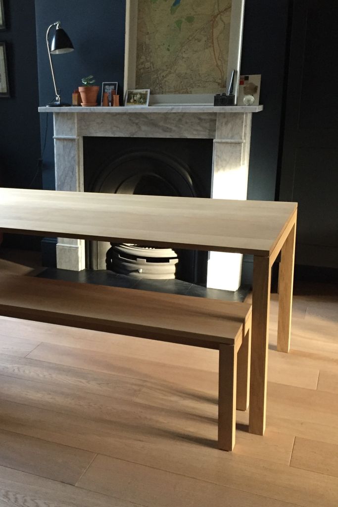 oak dining table with slim top and matching benches