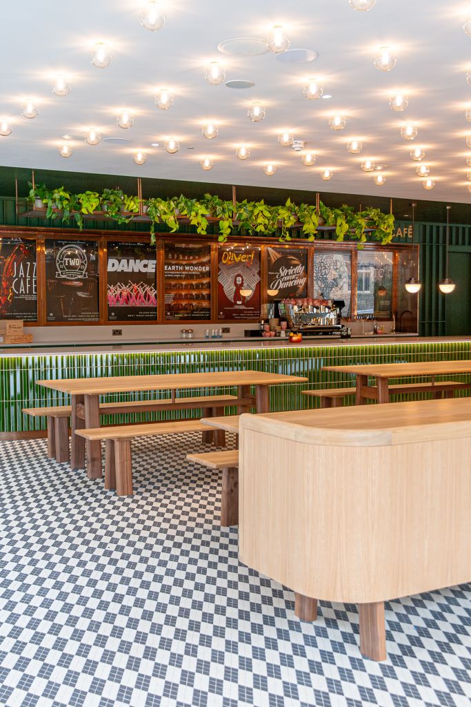 cafe space with tables and benches made from oak and walnut